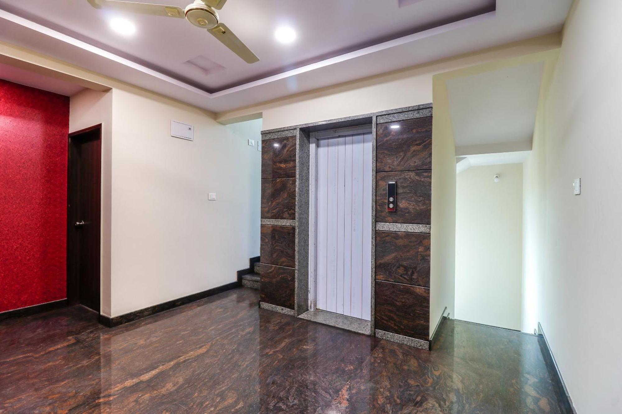 Capital O N R Residency Hotel Yelahanka Bagian luar foto